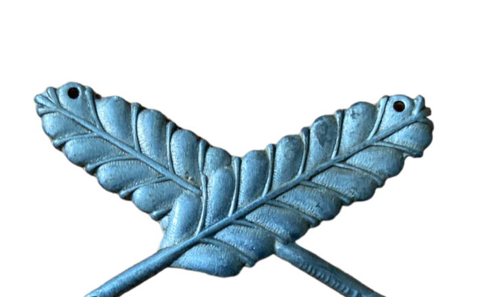 Een kraagembleem van de NAD voor de functie van onder opzichter